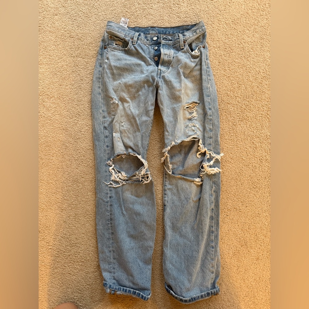 Levi's 501 ripped jeans